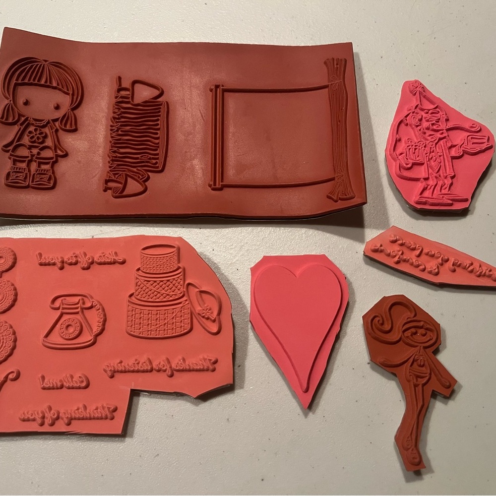 Assorted Rubber Stamps in Red and Pink